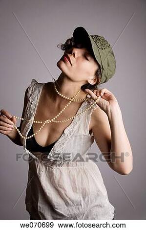 brunette, cap, contemporary View Large Photo Image Stock Photo - brunette, cap, contemporary. Fotosearch