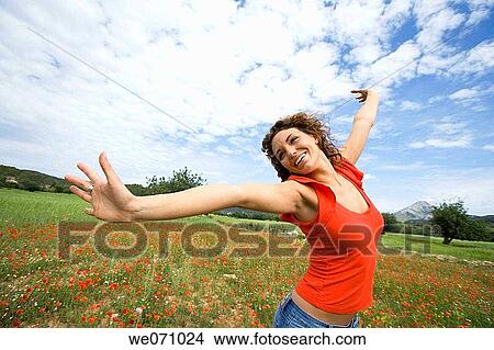 brunette, carefree, Arms open View Large Photo Image Picture - brunette, carefree, Arms open. Fotosearch