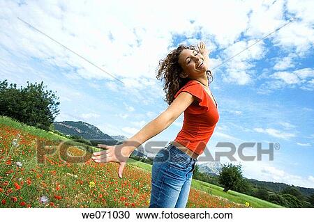 brunette, carefree, Arms open View Large Photo Image Stock Image - brunette, carefree, Arms open. Fotosearch