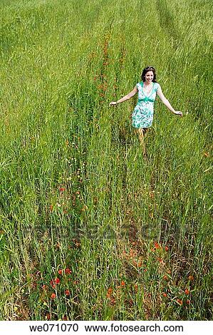brunette, carefree, Arms open View Large Photo Image Stock Image - brunette, carefree, Arms open. Fotosearch