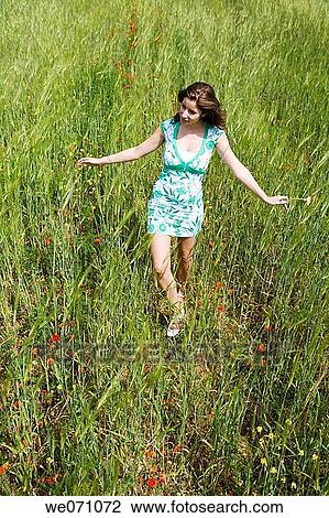 brunette, carefree, Arms open View Large Photo Image Stock Image - brunette, carefree, Arms open. Fotosearch