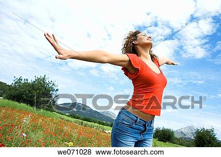 brunette, carefree, Arms open View Large Photo Image Stock Photo - brunette, carefree, Arms open. Fotosearch