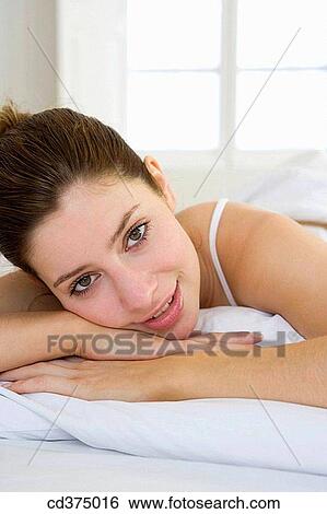 Stock Photograph - brunette, chilling out, Close-up. Fotosearch