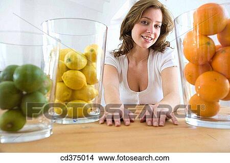 brunette, Citrus fruit, 20's View Large Photo Image Picture - brunette, Citrus fruit, 20's. Fotosearch