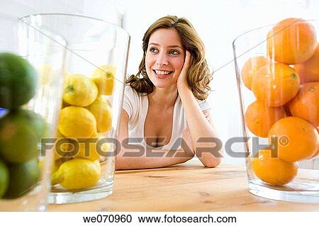 brunette, Citrus fruit, 20's View Large Photo Image Stock Image - brunette, Citrus fruit, 20's. Fotosearch