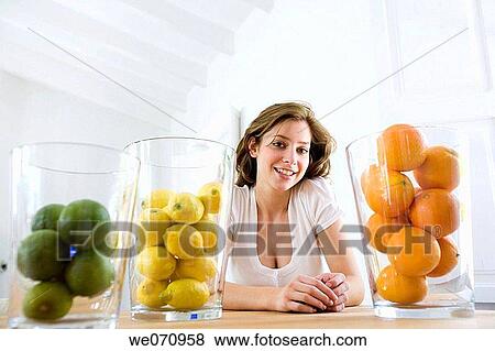 brunette, Citrus fruit, 20's View Large Photo Image Stock Photo - brunette, Citrus fruit, 20's. Fotosearch
