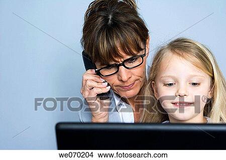 Picture - business, businesspeople, businesswoman, calling. Fotosearch