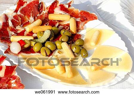 Cheese and cured ham, April Fair, Barcelona. Catalonia, Spain View Large Photo Image Stock Image - Cheese and cured ham, April Fair, Barcelona. Catalonia, Spain. Fotosearch