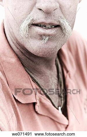 Close-up of a man with a mustache View Large Photo Image Stock Image - Close-up of a man with a mustache. Fotosearch