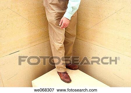 Close-up of a man's legs, arm, and hand View Large Photo Image Stock Photo - Close-up of a man's legs, arm, and hand. Fotosearch