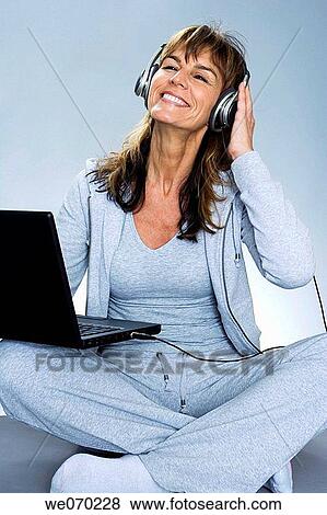 computer, contemporary, cross-legged View Large Photo Image Stock Photo - computer, contemporary, cross-legged. Fotosearch