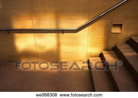 Stock Photo - Concrete staircase with a handrail.. Fotosearch