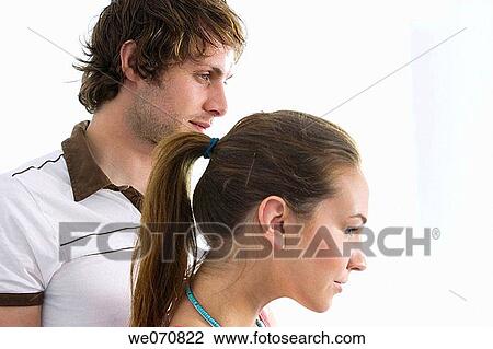 Stock Image - contemporary, couple, at-home. Fotosearch