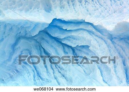 Details of icebergs and bergy bits in and around the Antarctic Peninsula during the summer months. Global warming is melting ice in this area at an alarming rate. View Large Photo Image Picture - Details of icebergs and bergy bits in and around the Antarctic Peninsula during the summer months. Global warming is melting ice in this area at an alarming rate.. Fotosearch