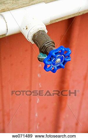 Dripping water faucet. View Large Photo Image Stock Photo - Dripping water faucet.. Fotosearch