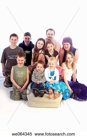Stock Photography - eight children all brothers and sisters from one family, with their parents. Fotosearch