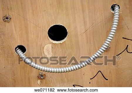 Electrical cable running through board View Large Photo Image Stock Image - Electrical cable running through board. Fotosearch