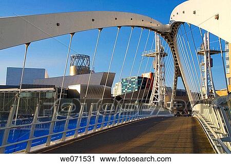 Stock Image - Europe, UK, England, Manchester, Salford Quays, Lowry center dusk. Fotosearch