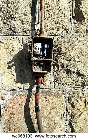 Stock Image - Exposed electrical connection box. Budapest. Hungary. Fotosearch