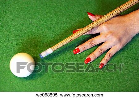 Female hand with red nails holding the queue and targeting the white ball at a snooker game, Bangkok, Thailand, Southeast Asia View Large Photo Image Stock Photography - Female hand with red nails holding the queue and targeting the white ball at a snooker game, Bangkok, Thailand, Southeast Asia. Fotosearch