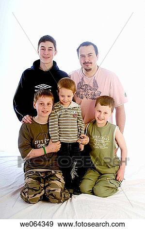 four brothers and their father, in the studio View Large Photo Image Stock Photo - four brothers and their father, in the studio. Fotosearch