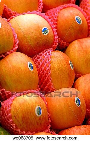 Stock Photography - Fuji apples for sale at La Boqueria market, Barcelona. Catalonia, Spain. Fotosearch