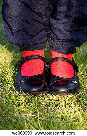 Girl child red socks View Large Photo Image Stock Image - Girl child red socks. Fotosearch