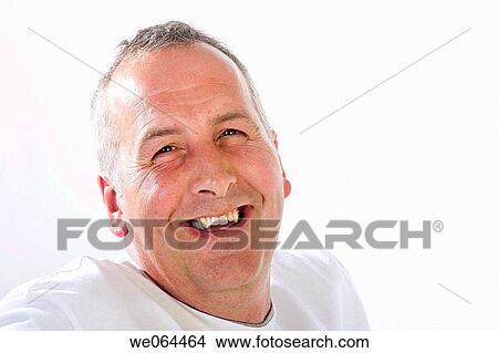 headshot of a 45 year old man smiling into camera View Large Photo Image Picture - headshot of a 45 year old man smiling into camera. Fotosearch