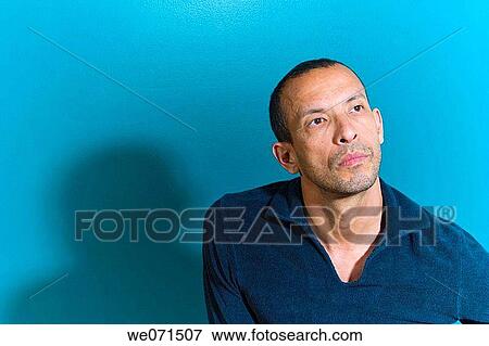 Hispanic man posing View Large Photo Image Stock Photo - Hispanic man posing. Fotosearch