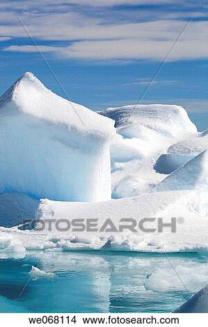 Picture - Icebergs in the Weddell Sea off the east coast of the Antarctic Peninsula. Ice is melting in this area of Antarctica at an alarming rate, probably due to Global Warming.. Fotosearch