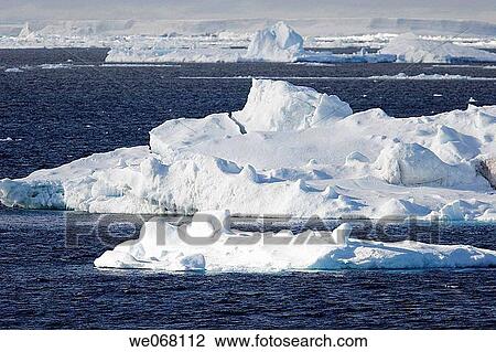 Icebergs in the Weddell Sea off the east coast of the Antarctic Peninsula. Ice is melting in this area of Antarctica at an alarming rate, probably due to Global Warming. View Large Photo Image Stock Image - Icebergs in the Weddell Sea off the east coast of the Antarctic Peninsula. Ice is melting in this area of Antarctica at an alarming rate, probably due to Global Warming.. Fotosearch