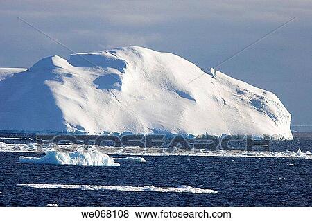 Icebergs in the Weddell Sea off the east coast of the Antarctic Peninsula. Ice is melting in this area of Antarctica at an alarming rate, probably due to Global Warming. View Large Photo Image Stock Photo - Icebergs in the Weddell Sea off the east coast of the Antarctic Peninsula. Ice is melting in this area of Antarctica at an alarming rate, probably due to Global Warming.. Fotosearch