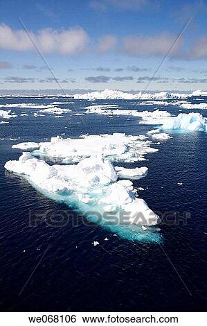 Icebergs in the Weddell Sea off the east coast of the Antarctic Peninsula. Ice is melting in this area of Antarctica at an alarming rate, probably due to Global Warming. View Large Photo Image Stock Photograph - Icebergs in the Weddell Sea off the east coast of the Antarctic Peninsula. Ice is melting in this area of Antarctica at an alarming rate, probably due to Global Warming.. Fotosearch