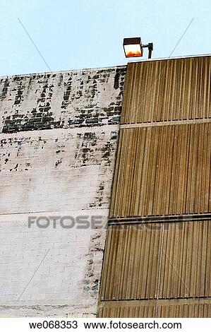Stock Image - Light on the roof of a building. Fotosearch