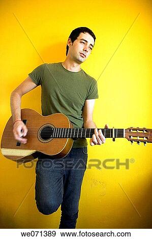 Man playing guitar View Large Photo Image Stock Photo - Man playing guitar. Fotosearch