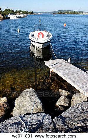 Motor-boat in a small marina on island Aln÷n, V? sternorrlands l? n, Sweden, Scandinavia, Europe View Large Photo Image Stock Image - Motor-boat in a small marina on island Aln÷n, V? sternorrlands l? n, Sweden, Scandinavia, Europe. Fotosearch