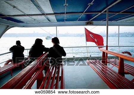 People on a ferry boat waiting for departure. Bosphore, Istanbul, Turkey View Large Photo Image Picture - People on a ferry boat waiting for departure. Bosphore, Istanbul, Turkey. Fotosearch