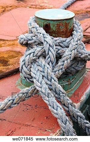Ropes for fastening a ship in a harbour, H? rn÷sand, V? sternorrlands l? n, Sweden, Scandinavia, Europe View Large Photo Image Stock Photography - Ropes for fastening a ship in a harbour, H? rn÷sand, V? sternorrlands l? n, Sweden, Scandinavia, Europe. Fotosearch