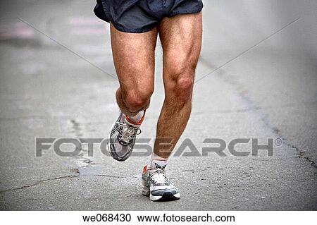 Runner during marathon race View Large Photo Image Stock Image - Runner during marathon race. Fotosearch