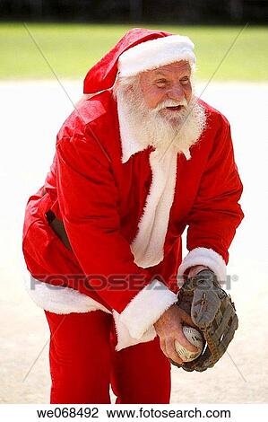 Santa gets ready to throw a pitch View Large Photo Image Stock Image - Santa gets ready to throw a pitch. Fotosearch