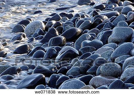 Sea floating over pebbles. H? lsangviken, Gr÷nsviksfj? rden, Norastr÷m, V? sternorrlands l? n, Sweden, Scandinavia, Europe View Large Photo Image Stock Photo - Sea floating over pebbles. H? lsangviken, Gr÷nsviksfj? rden, Norastr÷m, V? sternorrlands l? n, Sweden, Scandinavia, Europe. Fotosearch