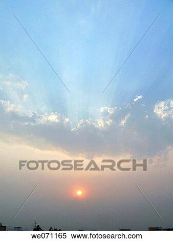 Sky and clouds with sunrays. Pune, Maharashtra, India. View Large Photo Image Stock Photography - Sky and clouds with sunrays. Pune, Maharashtra, India.. Fotosearch