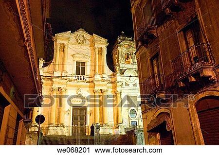 Small church lit at night and typical houses made out of dark volcanic rock. Catania. Sicily. Italy View Large Photo Image Stock Image - Small church lit at night and typical houses made out of dark volcanic rock. Catania. Sicily. Italy. Fotosearch