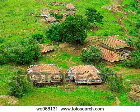 Small huts with sloping roof made of manglori tiles and agricultural land at rural area near Nilkantheshwar, Donje, Pune, Maharashtra, India. View Large Photo Image Stock Image - Small huts with sloping roof made of manglori tiles and agricultural land at rural area near Nilkantheshwar, Donje, Pune, Maharashtra, India.. Fotosearch