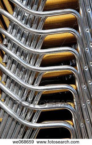 Stacked chairs View Large Photo Image Stock Photo - Stacked chairs. Fotosearch