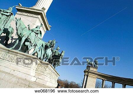 Statues and Millenary Monument Column in Heroes Square (Hosok Ter). Budapest. Hungary View Large Photo Image Stock Photograph - Statues and Millenary Monument Column in Heroes Square (Hosok Ter). Budapest. Hungary. Fotosearch