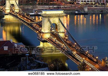 Szechenyi Chain Bridge over the Danube lit up at night viewed from Castle Hill. Budapest. Hungary View Large Photo Image Stock Photography - Szechenyi Chain Bridge over the Danube lit up at night viewed from Castle Hill. Budapest. Hungary. Fotosearch