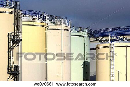 Tanks in industrial complex, Portes-l? s-Valence. France View Large Photo Image Stock Image - Tanks in industrial complex, Portes-l? s-Valence. France. Fotosearch