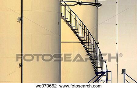 Stock Image - Tanks in industrial complex, Portes-l? s-Valence. France. Fotosearch