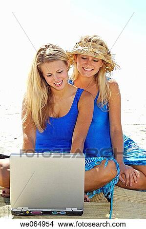 Teen age girls at the beach View Large Photo Image Picture - Teen age girls at the beach. Fotosearch